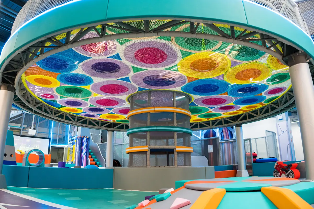 Colorful play structure with climbing nets